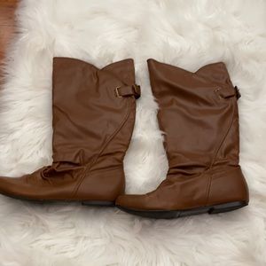 Brown leather mid-calf boots with buckle detail